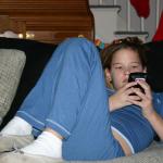 03_Kasey_using_the_Blackberry