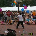 19 juggling three burning torches