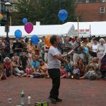 20 juggling three burning torches