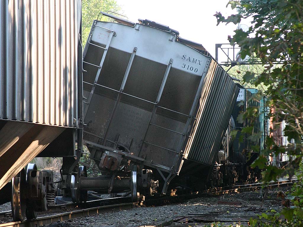 10 box car missing wheels closeup