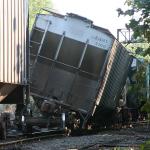 10 box car missing wheels closeup