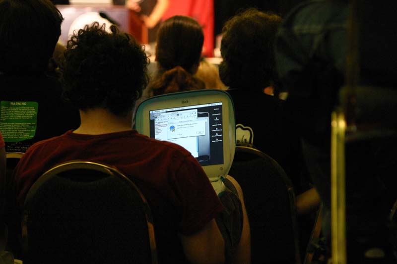 06 hacker chatting on an ibook