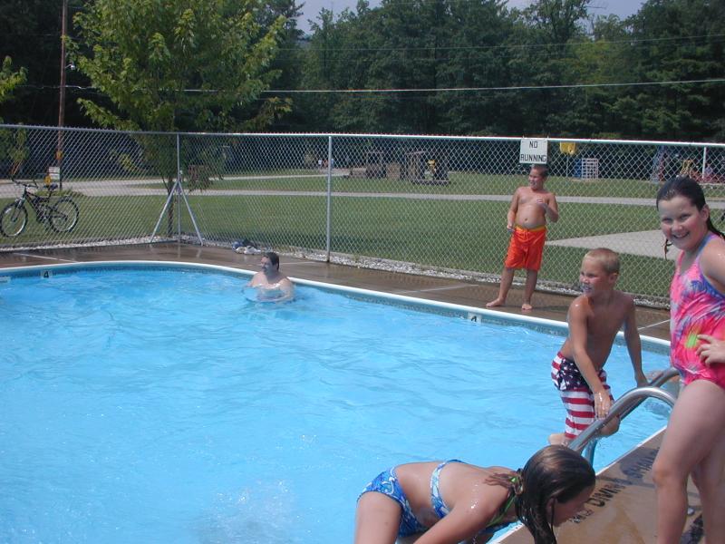 08_Kasey_climbing_out_of_the_pool