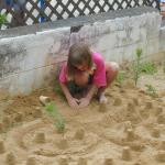 45_Rebecca_working_on_the_sand_castle