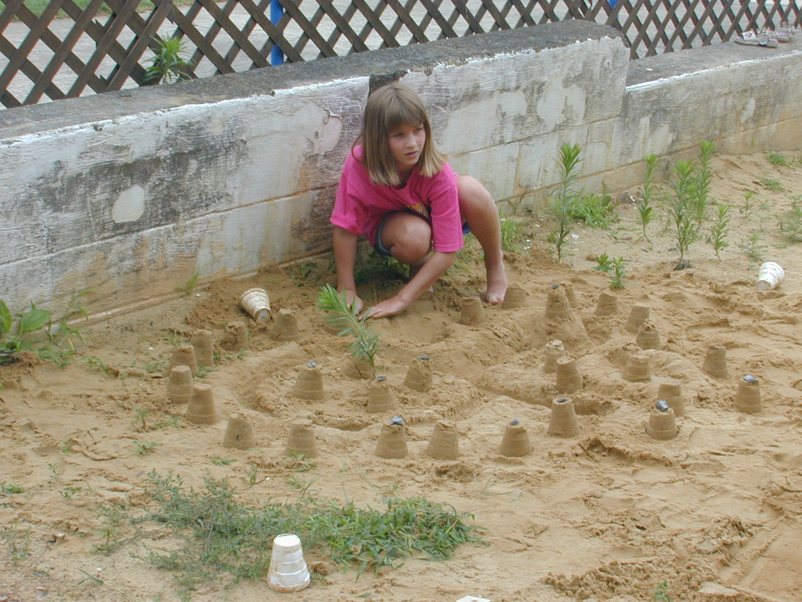 48_Rebecca_working_on_the_sand_castle