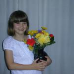 19_Rebecca_and_flowers_from_Gramma_Ginny