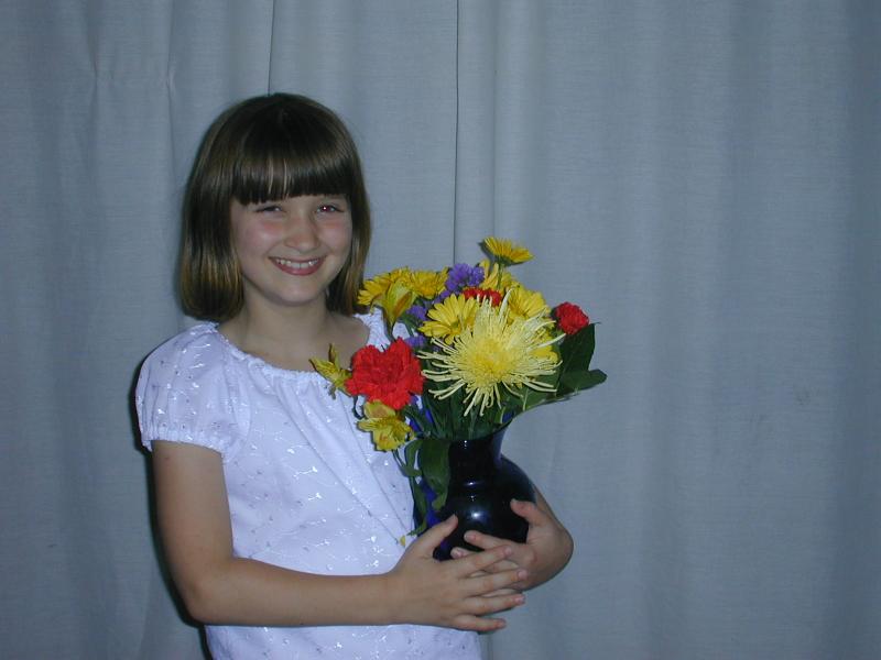 19_Rebecca_and_flowers_from_Gramma_Ginny