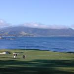 10 18th green at Pebble Beach clouds on mountain