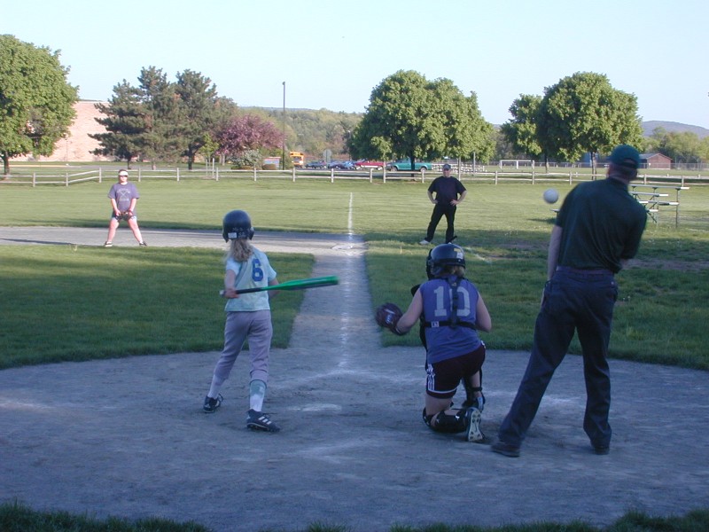 03 Emma swings and ball hits umpire