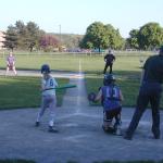 03 Emma swings and ball hits umpire