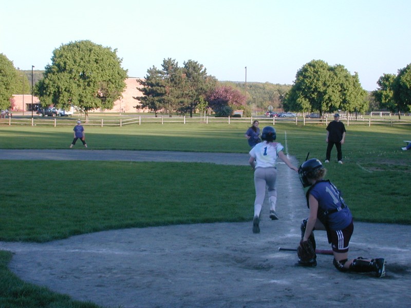 11 Amanda running to first base