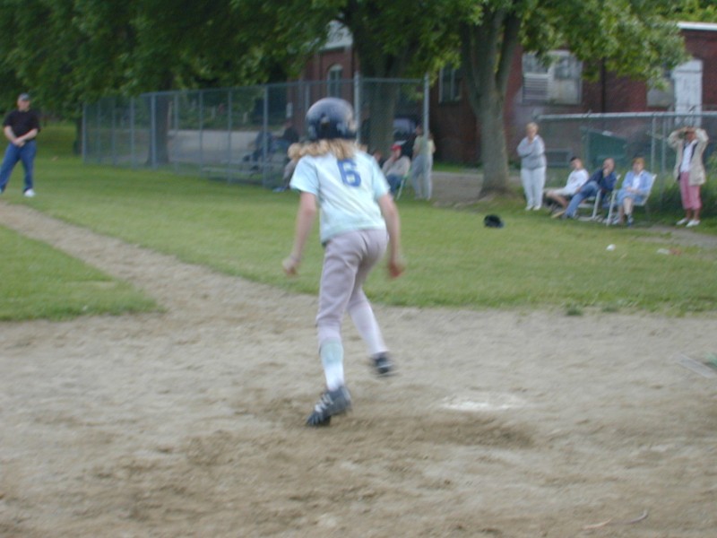 22 Emma going to first base