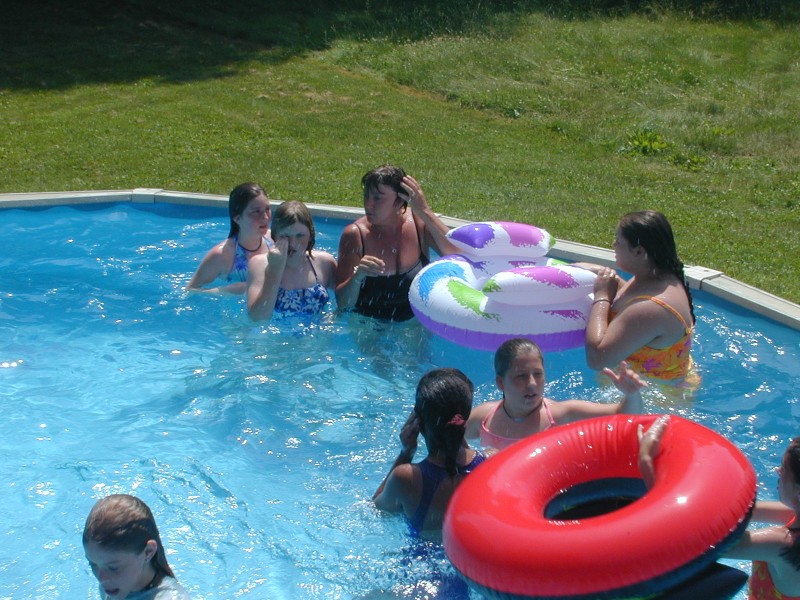 33 Deb and girls in the pool