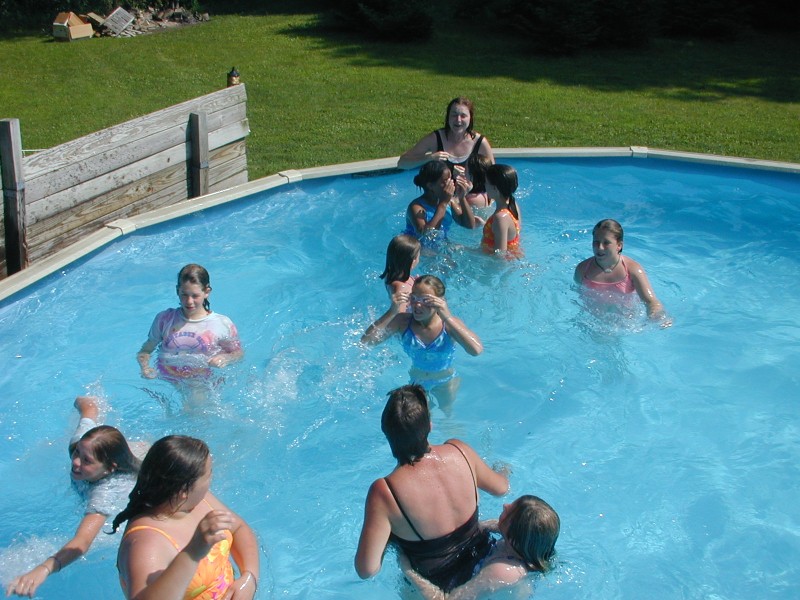 55 Mary and Deb in the pool with the girls