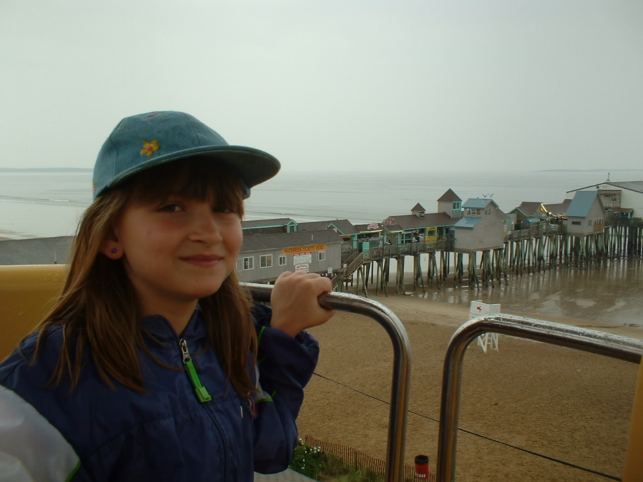 14_Rebecca_with_pier_in_background