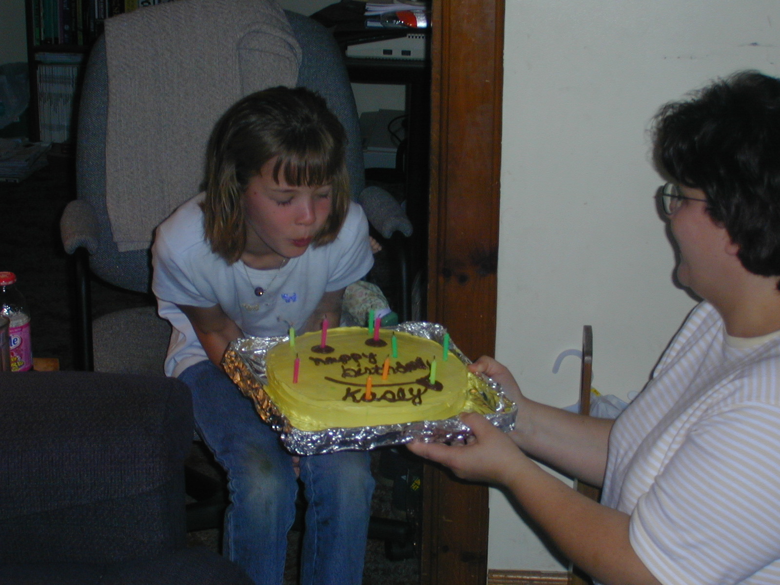 08_Kasey_blowing_out_candles