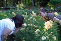 16_Jen_smelling_the_roses_and_Nora_eating_them