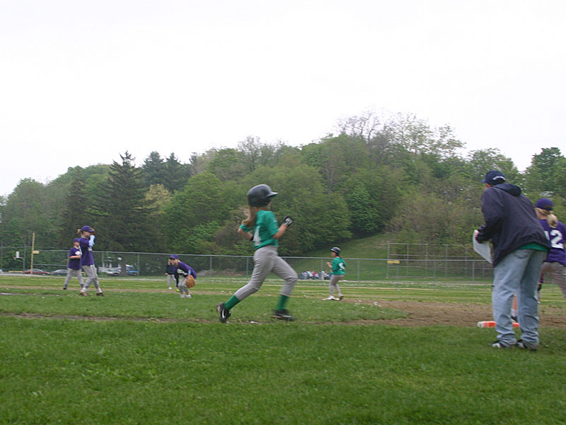 14 Rebecca running to first base